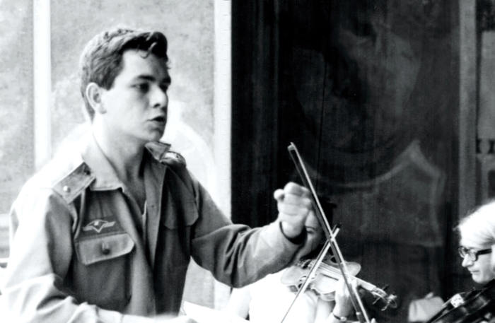 Jiří Bělohlávek conducting Orchestra Puellarum Pragensis in military uniform